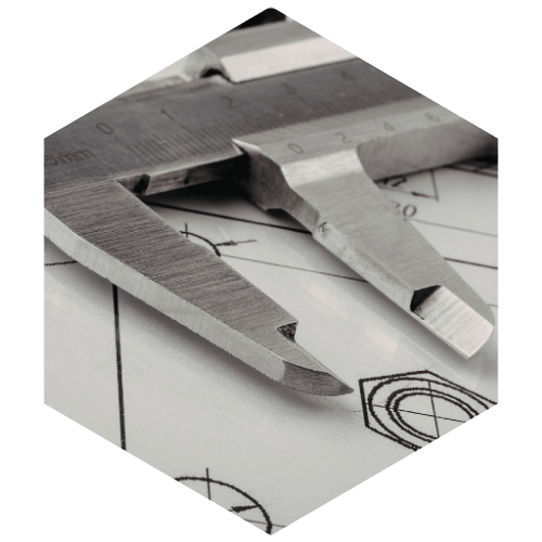 calipers being used to draw and measure